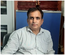 Professor Laxuman Sharma
